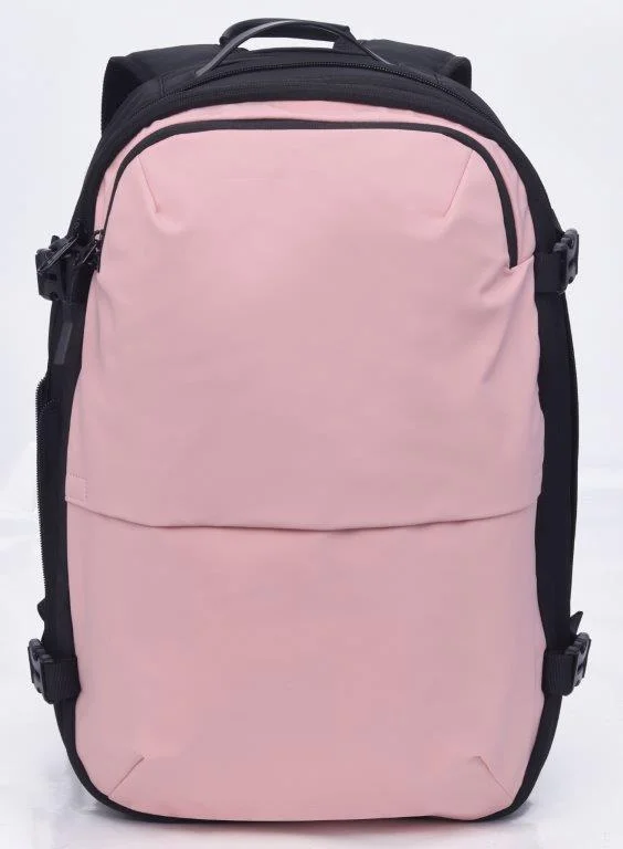 Canvas laptop bag with a detachable shoulder strap for versatilityTravelite - Vacuum Compression Travel backpack 17.3in with pump - Pink