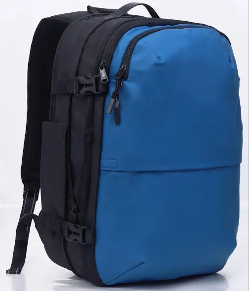 Expandable laptop bag to accommodate additional itemsTravelite - Vacuum Compression Travel backpack 17.3in with pump - Blue