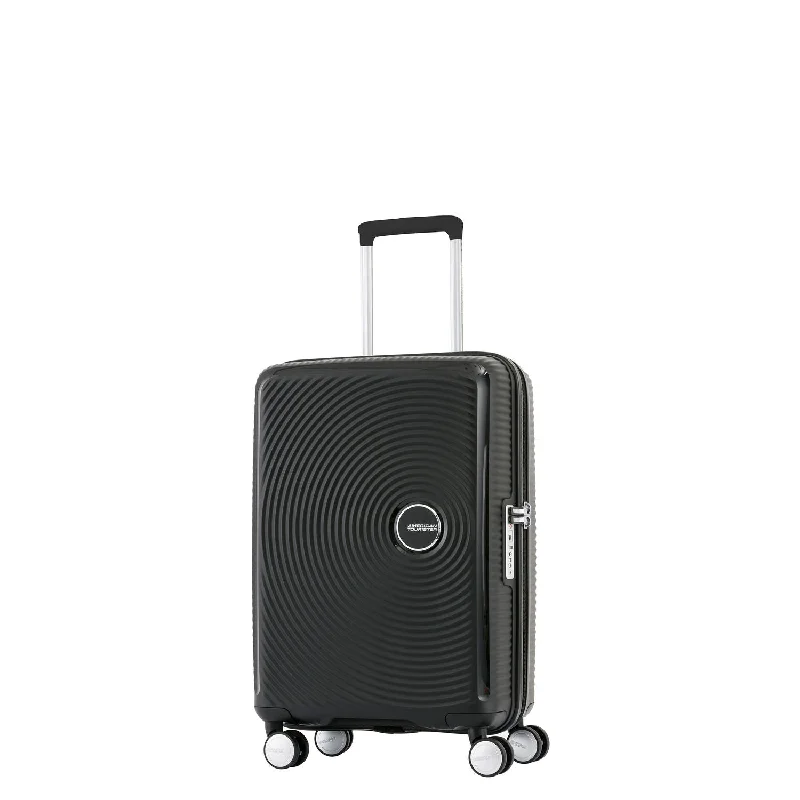 Waterproof luggage covers for protection against rain on outdoor tripsAmerican Tourister Curio Hardside Carry-On Spinner