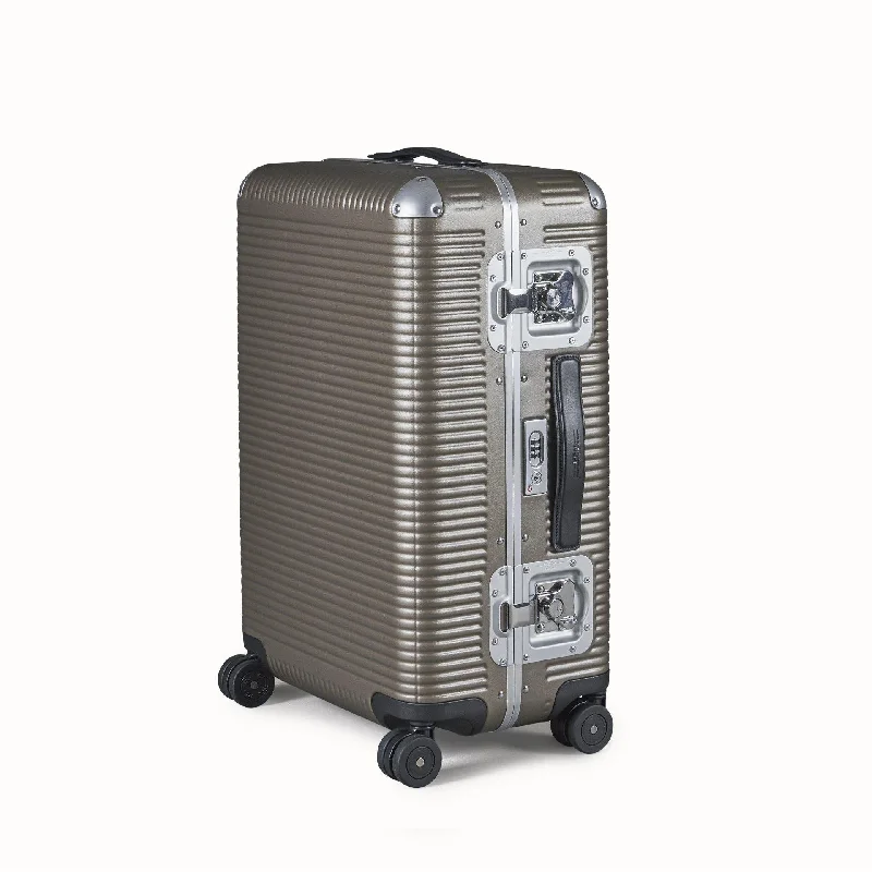 Luggage trolley organizers to hold small items like keys and phonesFPM Milano Bank Light Spinner 68