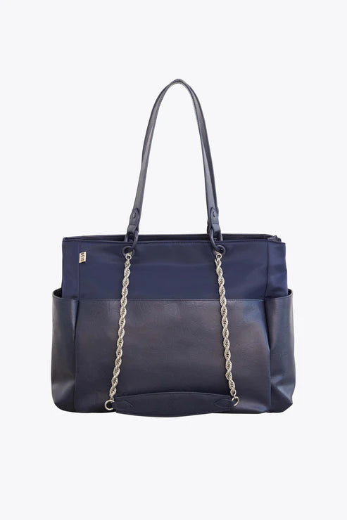 Vintage leather travel bag with brass accents for a classic and sophisticated lookThe Diaper Bag in Navy