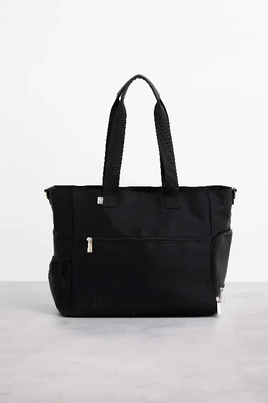 Convertible travel bag that can be used as a backpack or toteThe Pumping Bag in Black