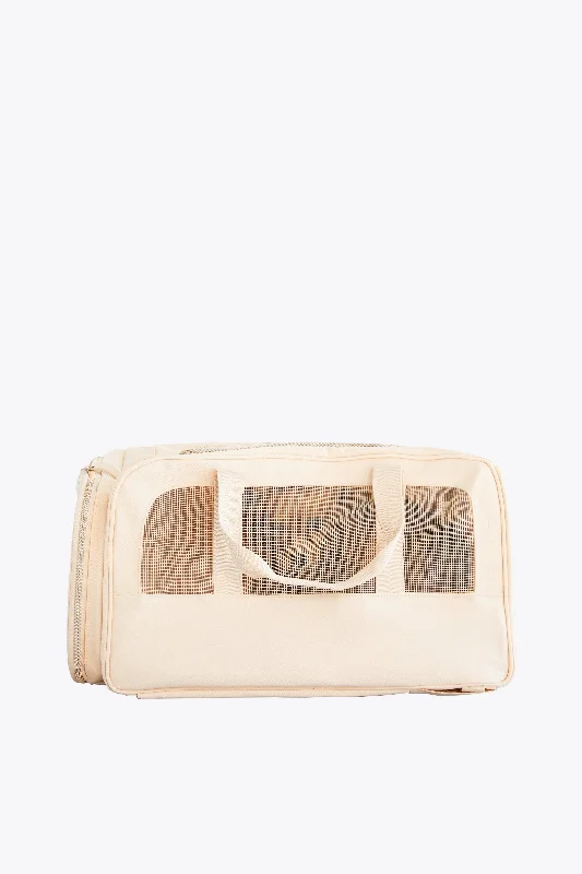 Soft - sided travel bag with reinforced corners for durabilityThe Regulation Pet Carry-on in Beige