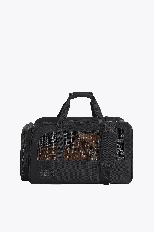 Vintage leather travel bag with brass accents for a classic and sophisticated lookThe Regulation Pet Carry-on in Black