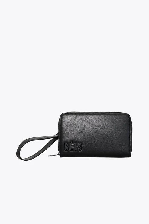 Vintage leather travel bag with brass accents for a classic and sophisticated lookThe Travel Wallet in Black