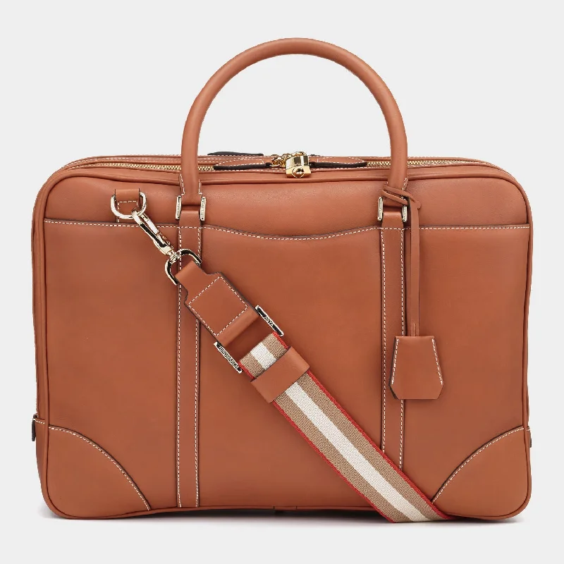 Rolling travel bag with adjustable telescopic handle for different user heightsBespoke Seymour Briefcase