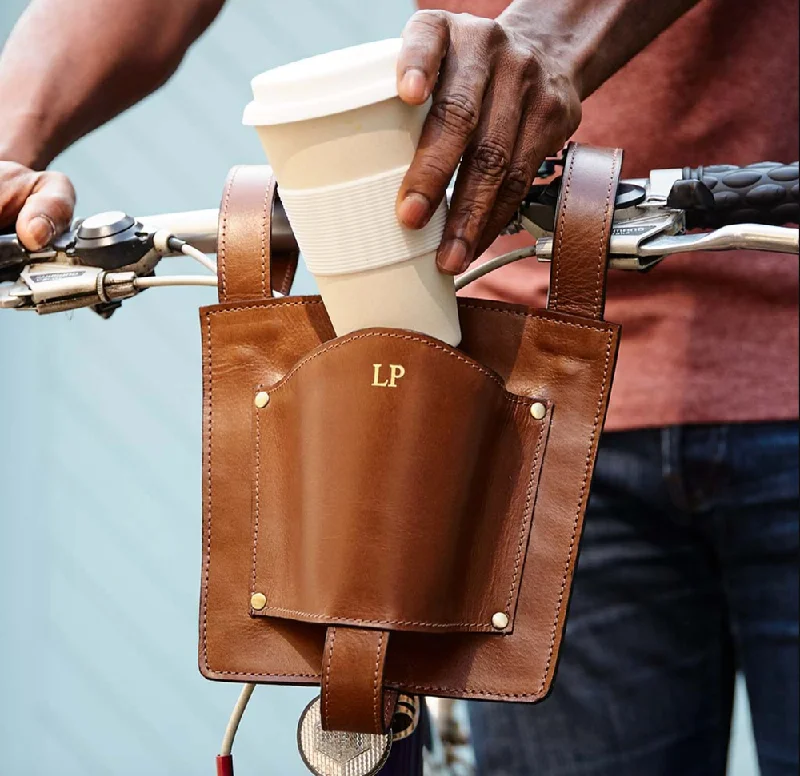 Travel bag with a built - in power bank charger for on - the - go device chargingLeather Bike Coffee Cup Holder