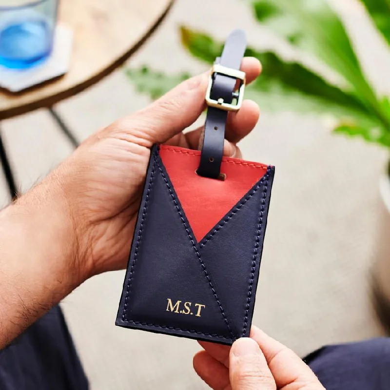 Smart travel bag with integrated GPS tracker for lost item recoveryLeather Envelope Luggage Tag