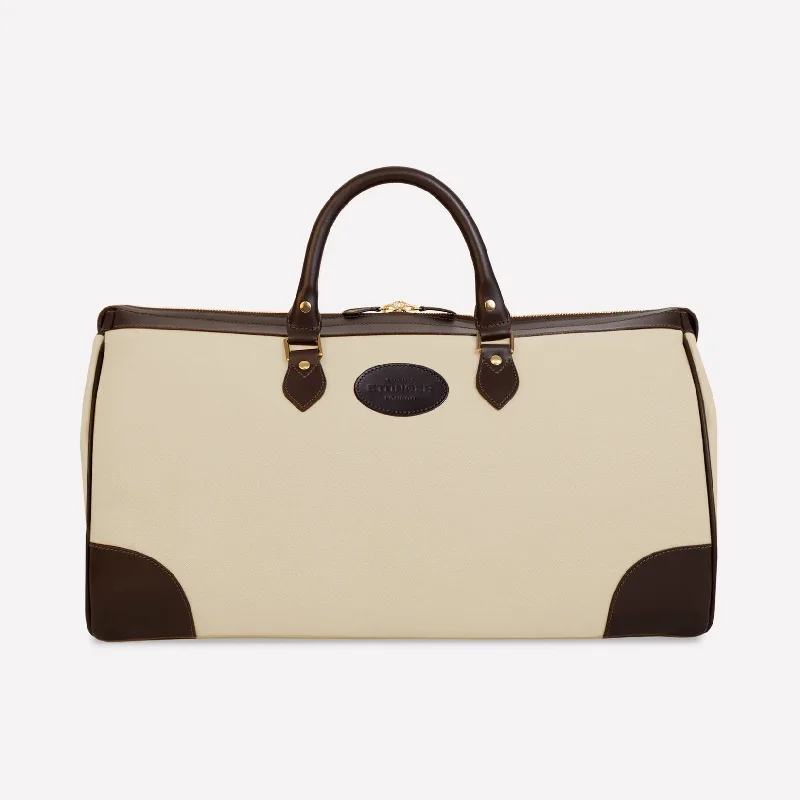 Vintage leather travel bag with brass accents for a classic and sophisticated lookNew Hurlingham Overnight Bag - Ivory