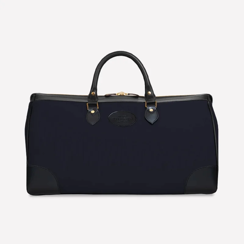 Vintage leather travel bag with brass accents for a classic and sophisticated lookNew Hurlingham Overnight Bag - Navy