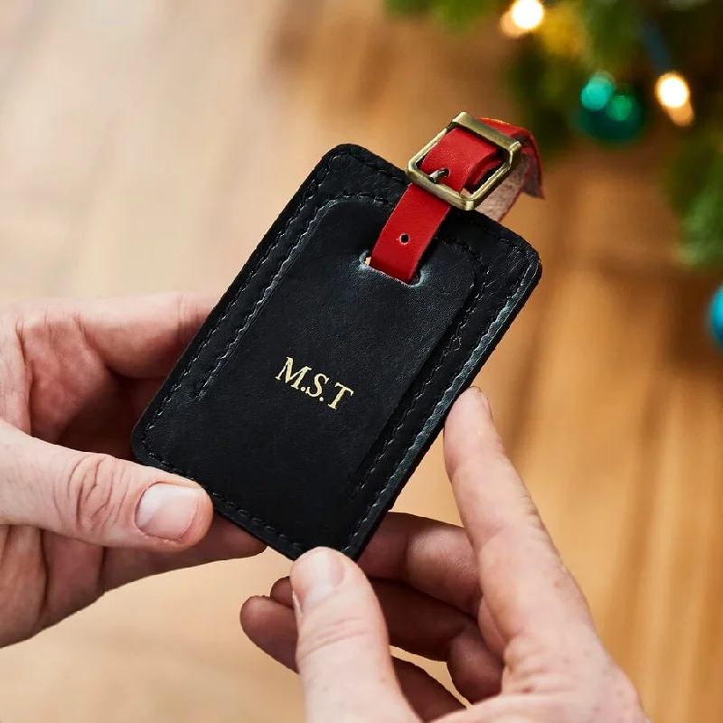 Smart travel bag with integrated GPS tracker for lost item recoveryPersonalised Luxury Leather Luggage Tag