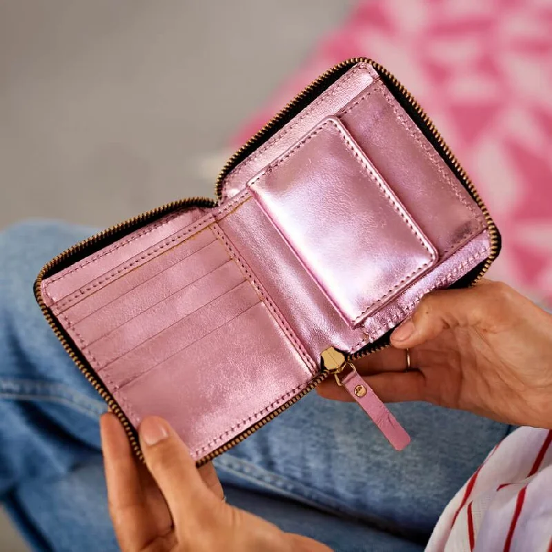 Travel bag with a built - in power bank charger for on - the - go device chargingSquare Leather Purse